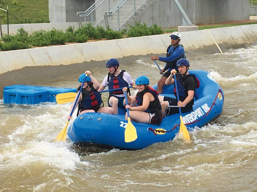 Students doing white-water rafting